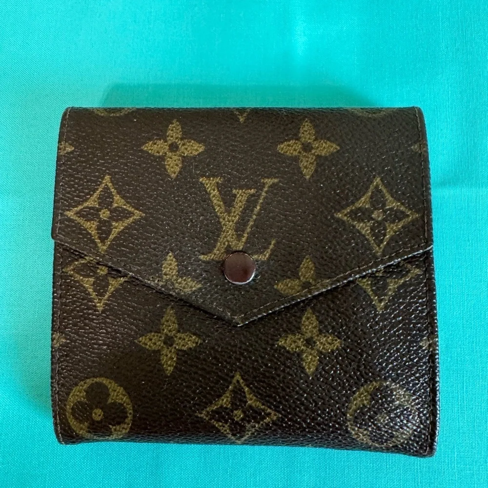 Louis Vuitton Double. Snap Monogram Wallet